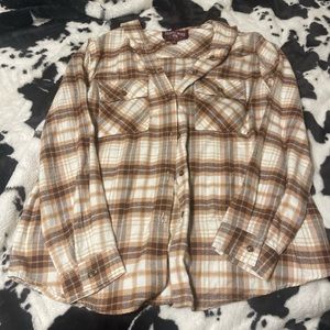 This is a medium brown white and tan, hooded plaid button up shirt.